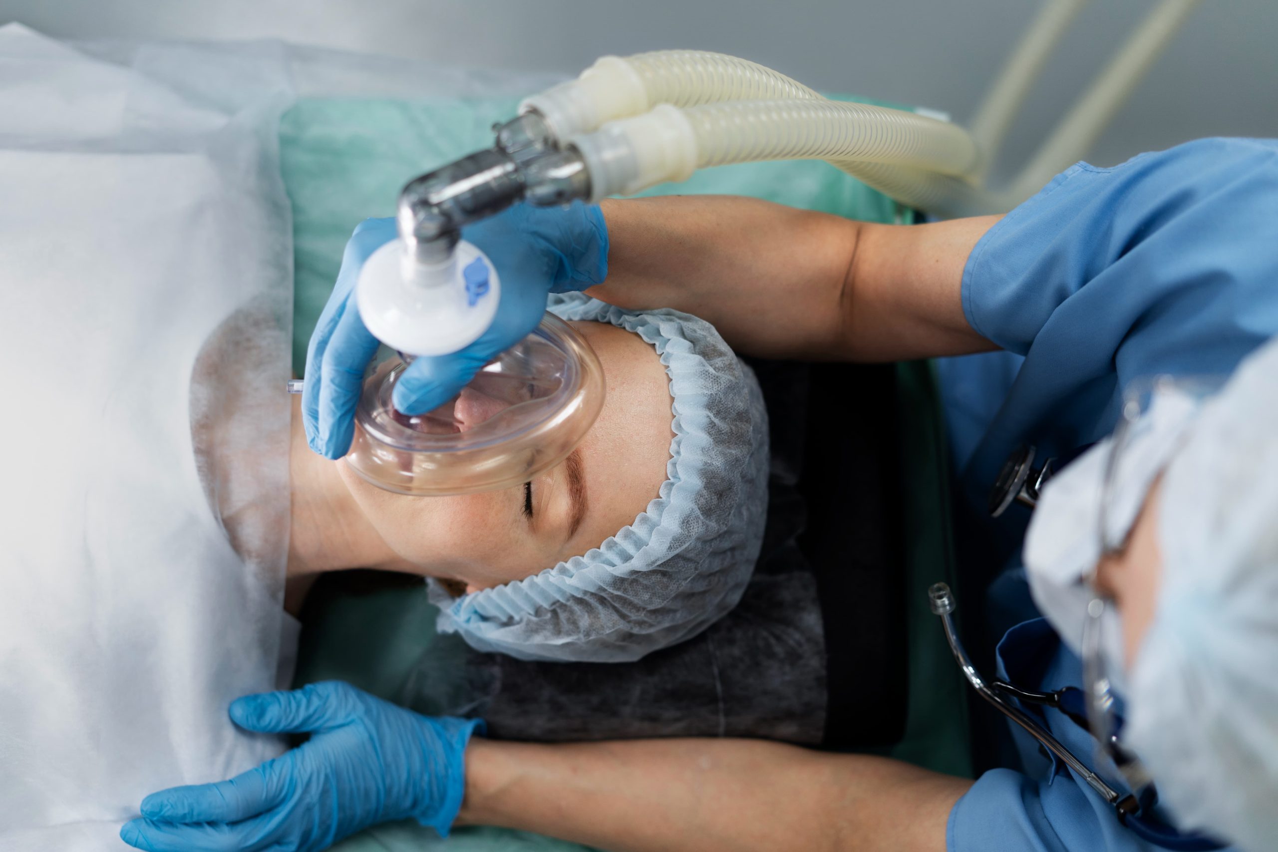 nurse-putting-oxygen-mask-patient (1) nurse-putting-oxygen-mask-patient (1)